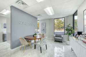 seating area with avanath logo signage