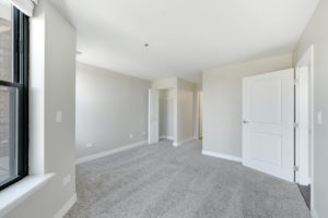 large bright carpeted room